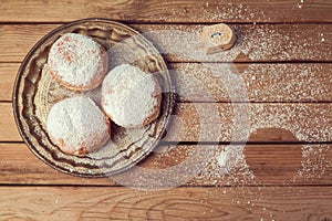 Jam doughnuts with icing sugar for Hanukkah holiday celebration