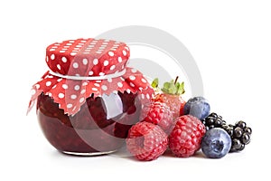 Jam and fresh berries photo