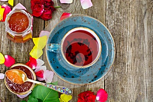 Jam Made of Rose Petals on the Old Wooden Boatds