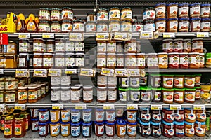 Jam and marmalade in glass jars of different types