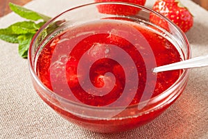 Jam Of Strawberries In Glass Bowl Close Up