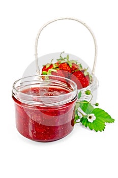 Jam strawberry with strawberries in a basket