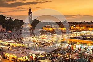 Jamaa el Fna market square in sunset, Marrakesh, Morocco, north Africa. photo