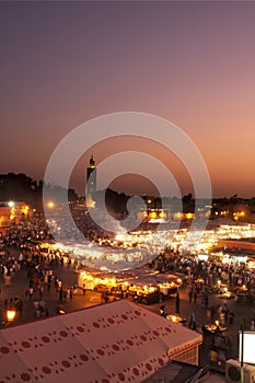 Jamaa el Fna square in Marrakech at sunset at