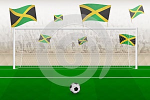 Jamaica football team fans with flags of Jamaica cheering on stadium, penalty kick concept in a soccer match