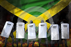 Jamaica protest fighting concept, police swat protecting peaceful people against mutiny - military 3D Illustration on flag