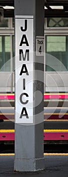 jamaica train station sign on train platform (long island, queens, new york city) commuter (subway) rail