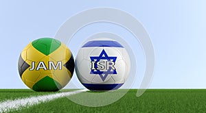 Jamaica vs. Israel Soccer Match - Soccer balls in Jamaicas and Israels national colors on a soccer field. photo