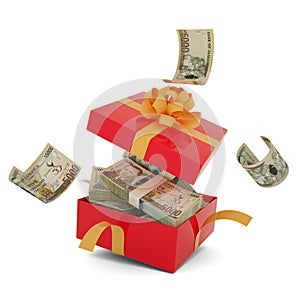 Jamaican dollar notes inside an open red gift box. Jamaican dollars inside and flying around a gift box