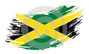 Jamaican flag grunge brush background. Vector illustration. photo