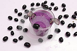 Jambolan plum or Java plum juice isolated on white background