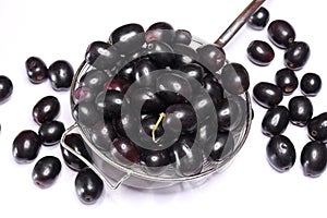 Jambolan plum or Java plum juice  on white background