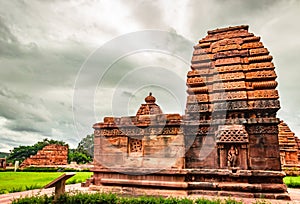 Jambulinga temple pattadakal breathtaking stone art from different angle with dramatic sky photo