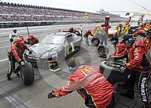 Jamie McMurray comes in for a pit stop