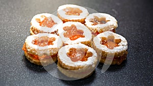 Jammy dodger, occhi di bue, cookies with jam and powdered sugar photo