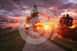 Jamnik church St Primus and Felician at sunrise, Slovenia, amazing landscape, dramatic sunrise