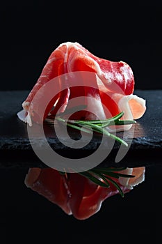 Jamon on a black background