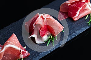 Jamon on a black background