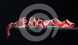 Jamon on a black background