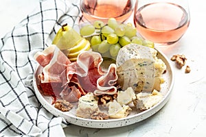 Jamon, cheese, pear and grapes, wine appetizer, Restaurant menu, dieting, cookbook recipe top view