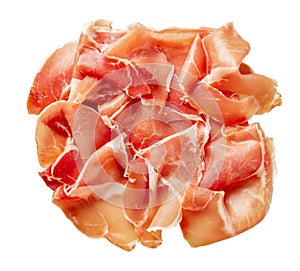 Jamon curado thinly sliced isolated on a white