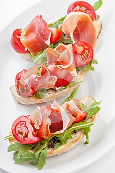 Jamon. Slices of Bread with Spanish Serrano Ham