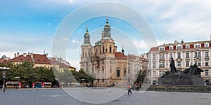 Jan Hus monument and the St. Nicholas` Church in Prague