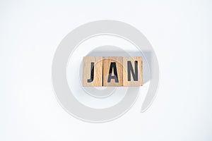 ` JAN ` text made of wooden cube on  White background