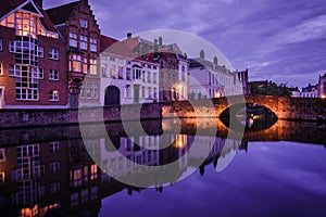 Jan van Eyckplein, old town of Bruges, Belgium during sunset.