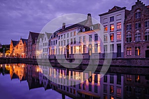 Jan van Eyckplein, old town of Bruges, Belgium during sunset.