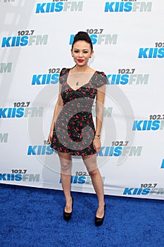Janel Parrish arrives at the