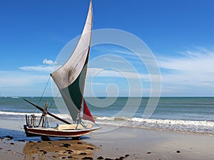 Jangada small sailboat on the beach, Brazil