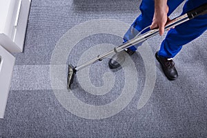 Janitor Cleaning Carpet