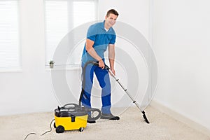 Janitor Cleaning Carpet photo