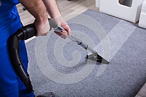 Janitor Cleaning Carpet photo