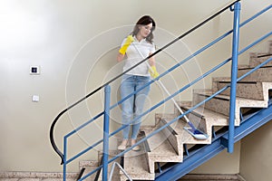 Janitor Cleaning Staircase