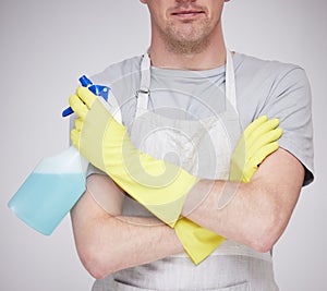 Janitor, hands and cleaning with spray, bottle or detergent product for maid service in home or business. Chemical