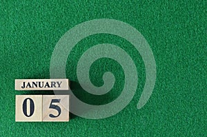 January 05, number cube on snooker table, sport background.