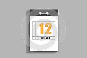 january 12. 12th day of month, calendar date.White page of tear-off calendar, on gray insulated wall. Concept of day of