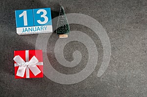 January 13th. Image 13 day of January month, calendar with x-mas gift. New year background with empty space for text