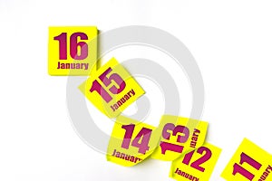 January 16th. Day 16 of month, Calendar date. Many yellow sheet of the calendar. Winter month, day of the year concept