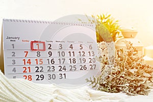 January 1th. Day 1 of month on white calendar. Concept of happy