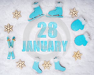 January 28th. Sports set with blue wooden skates, skis, sledges and snowflakes and a calendar date. Day 28 of month.