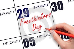 January 29. Hand writing text Freethinkers Day on calendar date. Save the date.