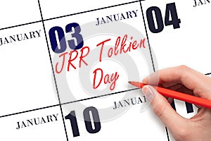 January 3. Hand writing text JRR Tolkien Day on calendar date. Save the date.