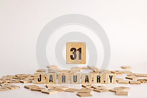January 31 displayed on wooden letter blocks on white background
