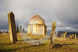 January gloomy day at an old Muslim cemetery. Eddie Gumbez mausoleum complex. Shamakhi, Azerbaijan