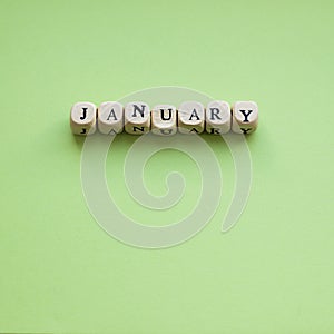 January on a Lime green background