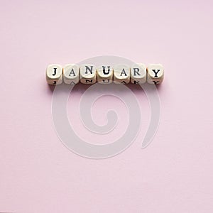 January on a Pale Pink background