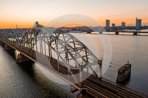 Amazing aerial view of the sunset over Old town of Riga, Vecriga in Latvia. River Daugava